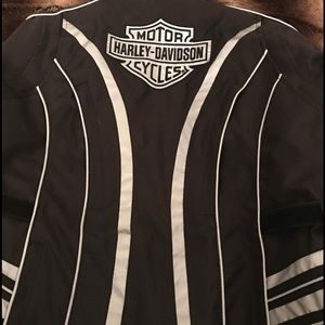 Woman’s Harley Davidson coat with removable armor. Reflective. Size M.